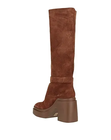 https://images.styletyx.com/images/brown-leather-boots-clergerie-1549565576_3.webp