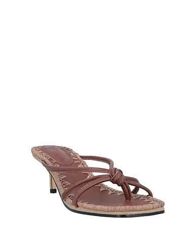 https://images.styletyx.com/images/brown-leather-flip-flops-mara-mine-1224382821_2.webp