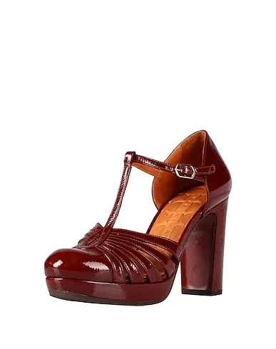 https://images.styletyx.com/images/brown-leather-pump-chie-mihara-2417404_2.webp