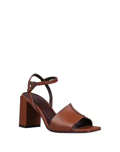 https://images.styletyx.com/images/brown-leather-sandals-hazy-611739670_2.webp