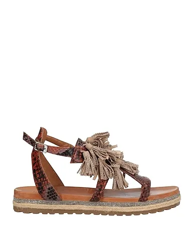 https://images.styletyx.com/images/brown-leather-sandals-la-femme-plus-13316328_1.webp
