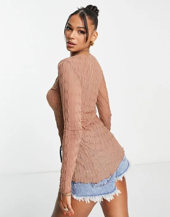 https://images.styletyx.com/images/bubble-effect-y2k-cardigan-in-wavy-mesh-motel-3154160_2.webp
