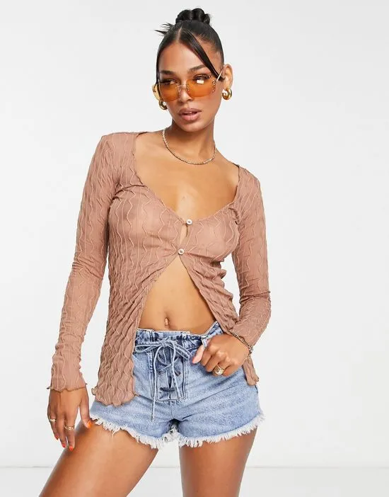 https://images.styletyx.com/images/bubble-effect-y2k-cardigan-in-wavy-mesh-motel-3154160_3.webp