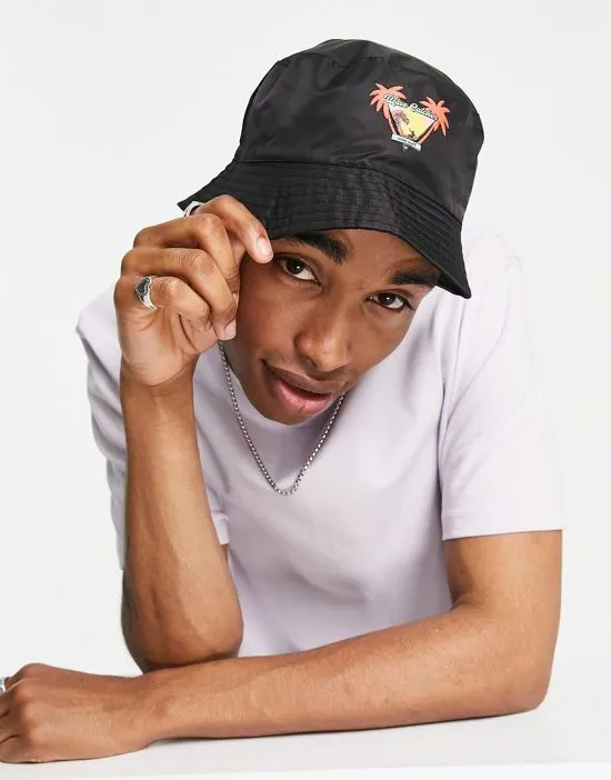 https://images.styletyx.com/images/bucket-hat-in-black-with-surf-print-black-asos-design-13259963_1.webp