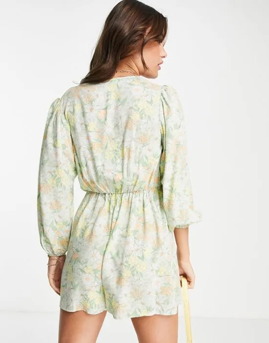 https://images.styletyx.com/images/bunny-tie-front-romper-in-green-retro-floral-miss-selfridge-1754274_3.webp