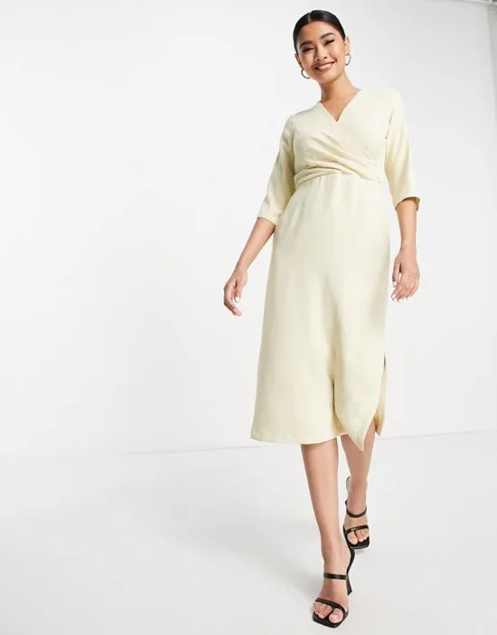 https://images.styletyx.com/images/button-side-wrap-midi-dress-in-ecru-closet-london-1824692_4.webp