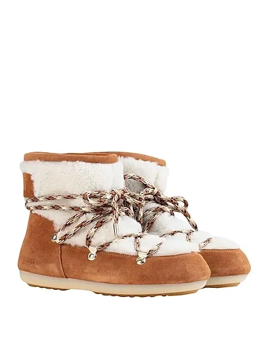https://images.styletyx.com/images/camel-ankle-boot-m-boot-dk-side-low-shearling-moon-boot-3031519_2.webp