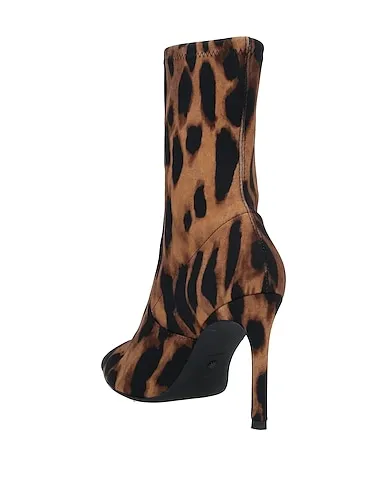 https://images.styletyx.com/images/camel-jersey-ankle-boot-stuart-weitzman-665106_3.webp
