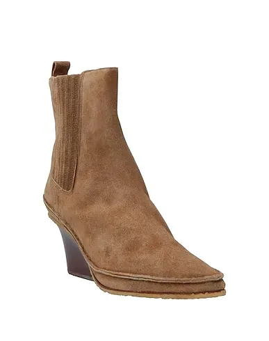 https://images.styletyx.com/images/camel-leather-ankle-boot-tory-burch-13030428_2.webp