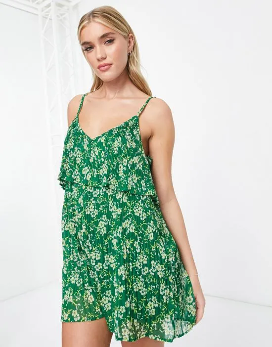 https://images.styletyx.com/images/cami-flippy-romper-in-green-floral-wednesday-s-girl-1754439_4.webp