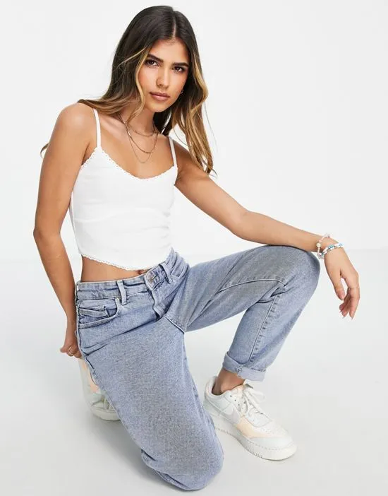 https://images.styletyx.com/images/cami-with-scarf-hem-and-lace-trim-in-white-asos-design-2756271_1.webp