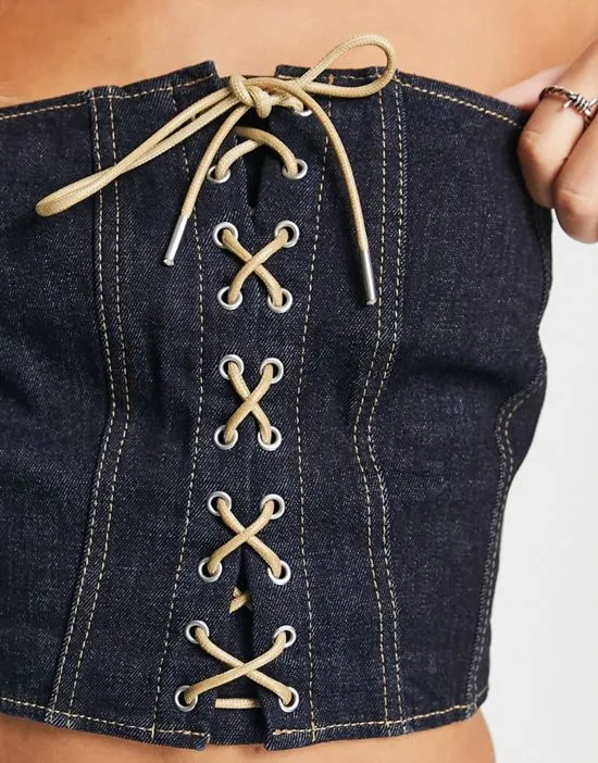 https://images.styletyx.com/images/casey-denim-bustier-lace-up-top-in-blue-rinse-part-of-a-set-weekday-13140085_4.webp