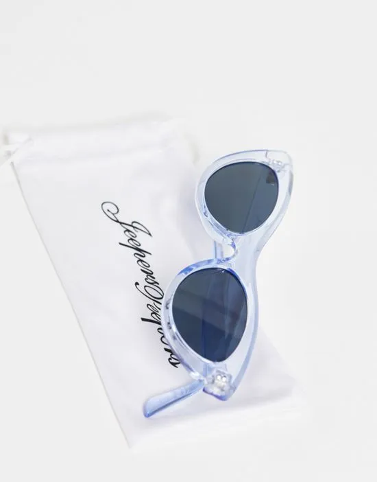 https://images.styletyx.com/images/cat-eye-sunglasses-in-transparent-blue-jeepers-peepers-1916141_2.webp