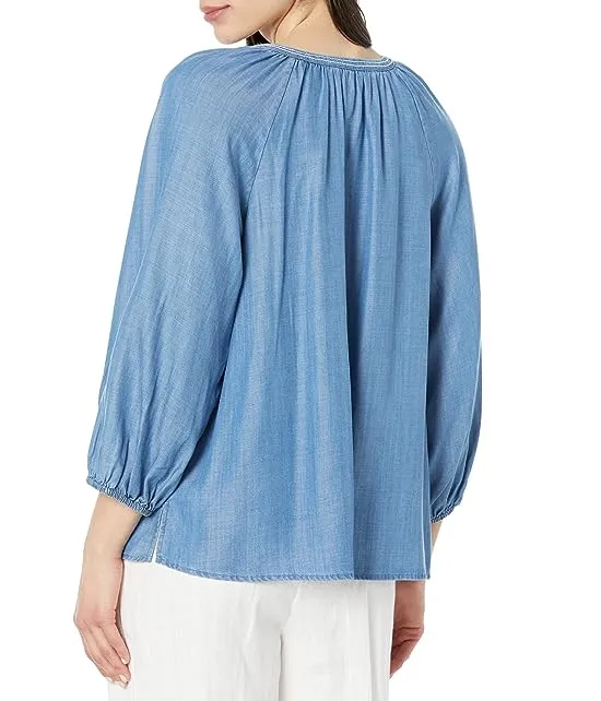https://images.styletyx.com/images/chambray-all-day-3-4-sleeve-top-tommy-bahama-13305745_2.webp