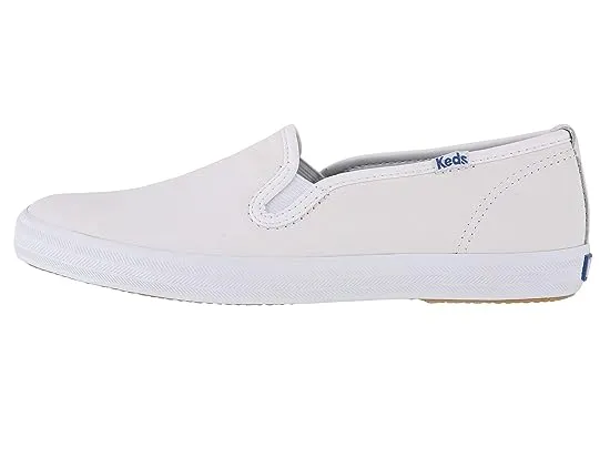https://images.styletyx.com/images/champion-leather-slip-on-keds-1966989_4.webp
