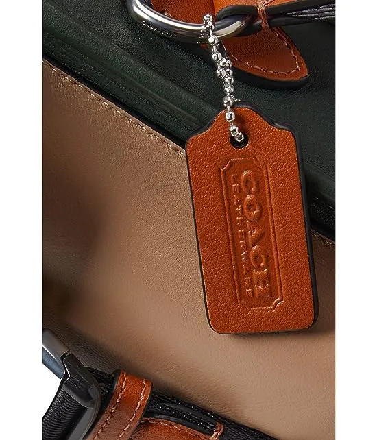 https://images.styletyx.com/images/charter-north-south-crossbody-with-hybrid-in-color-block-smooth-leather-coach-776810610_4.webp