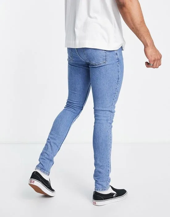 https://images.styletyx.com/images/chase-skinny-jeans-in-light-wash-dr-denim-1836281_2.webp