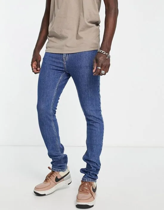 https://images.styletyx.com/images/chase-skinny-jeans-in-mid-wash-dr-denim-1835907_1.webp