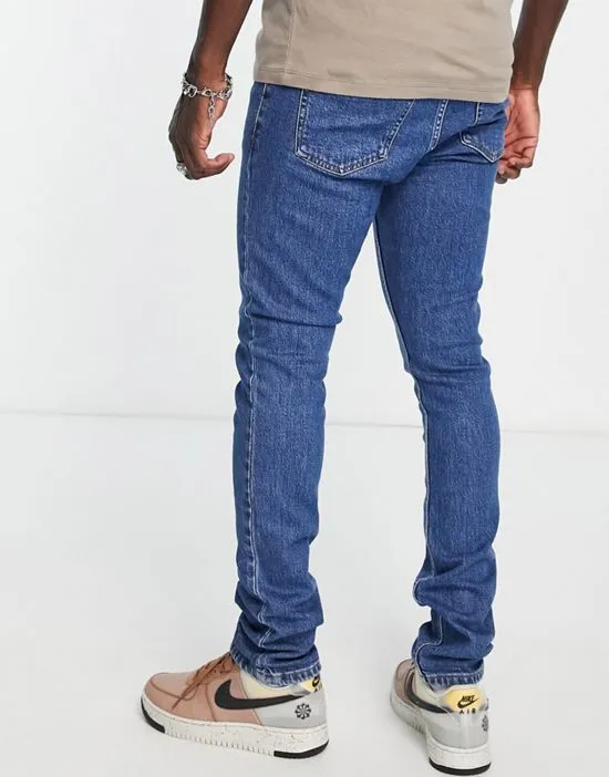 https://images.styletyx.com/images/chase-skinny-jeans-in-mid-wash-dr-denim-1835907_4.webp