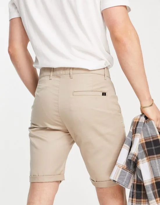 https://images.styletyx.com/images/chino-shorts-in-beige-le-breve-1890735_4.webp