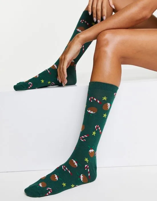 https://images.styletyx.com/images/christmas-calf-length-socks-in-candy-cane-print-in-green-asos-design-2685766_1.webp