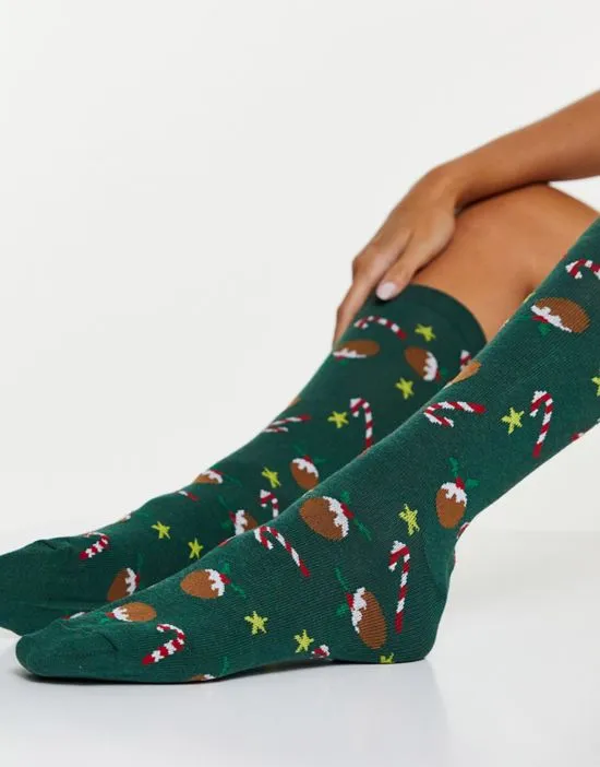https://images.styletyx.com/images/christmas-calf-length-socks-in-candy-cane-print-in-green-asos-design-2685766_2.webp