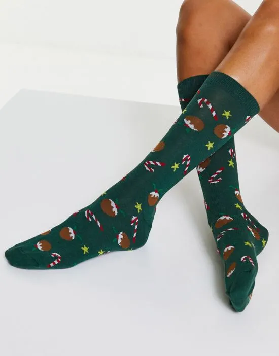 https://images.styletyx.com/images/christmas-calf-length-socks-in-candy-cane-print-in-green-asos-design-2685766_3.webp
