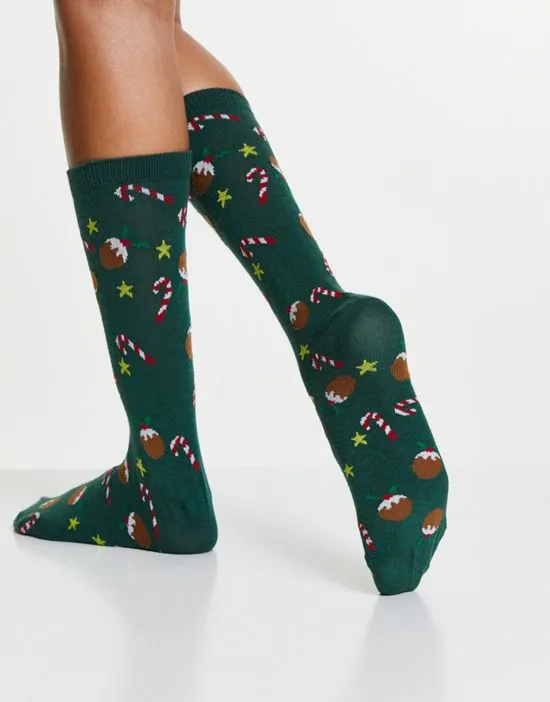 https://images.styletyx.com/images/christmas-calf-length-socks-in-candy-cane-print-in-green-asos-design-2685766_4.webp