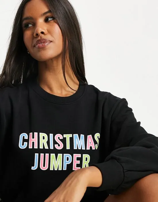 https://images.styletyx.com/images/christmas-multicolored-printed-sweater-in-black-threadbare-3050115_3.webp