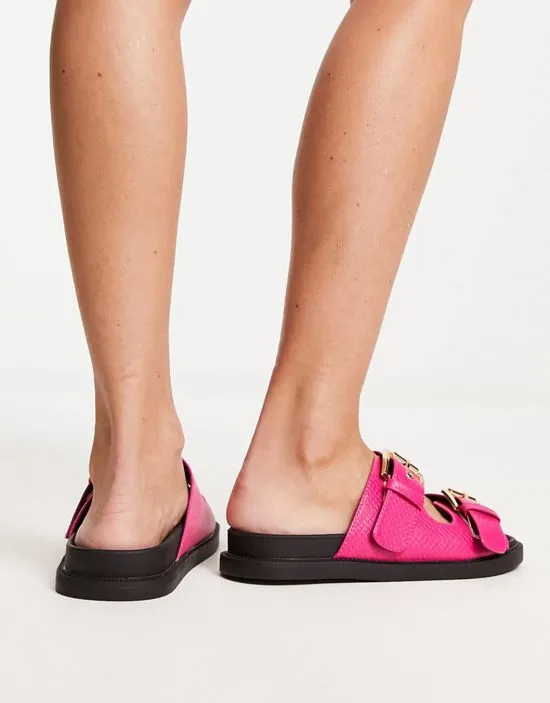 https://images.styletyx.com/images/chunky-double-buckle-footbed-slides-in-pink-london-rebel-13315880_2.webp