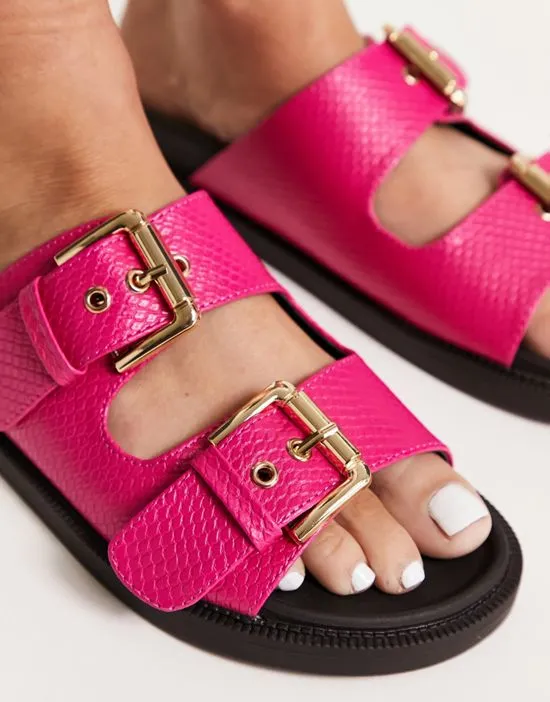 https://images.styletyx.com/images/chunky-double-buckle-footbed-slides-in-pink-london-rebel-13315880_3.webp