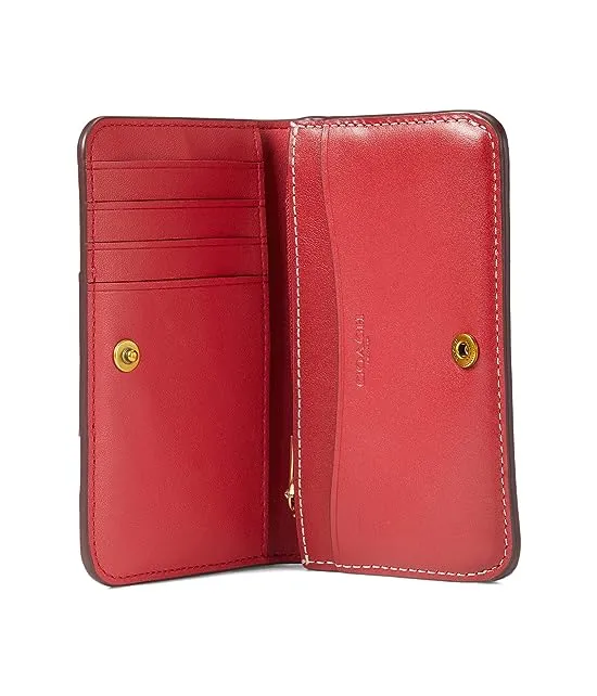 https://images.styletyx.com/images/coated-canvas-signature-with-heart-print-slim-card-case-coach-309274464_3.webp