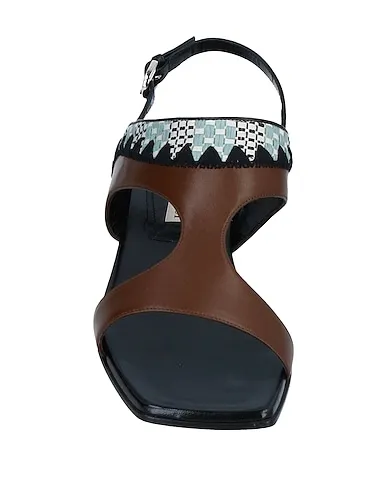 https://images.styletyx.com/images/cocoa-leather-sandals-emilio-pucci-1178293_4.webp