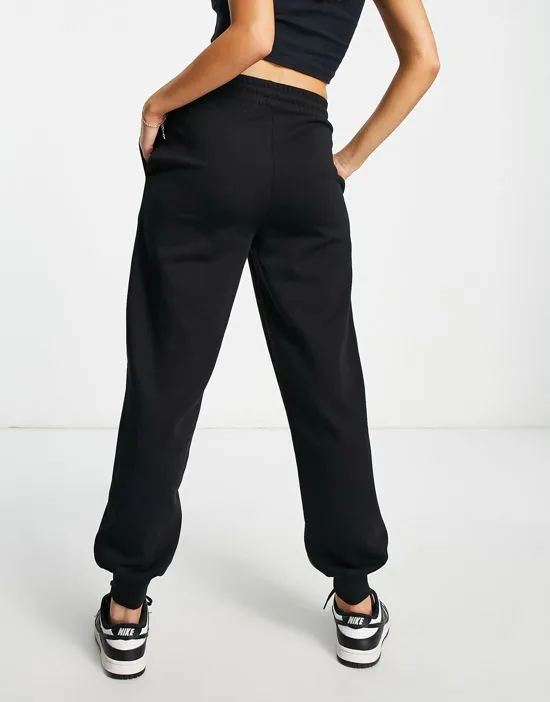 https://images.styletyx.com/images/collusion-oversized-branded-sweatpants-in-black-collusion-13000652_2.webp
