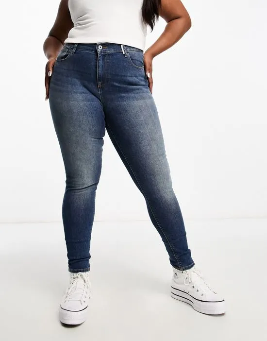https://images.styletyx.com/images/collusion-plus-x001-high-waisted-skinny-jeans-in-mid-blue-collusion-2765920_3.webp