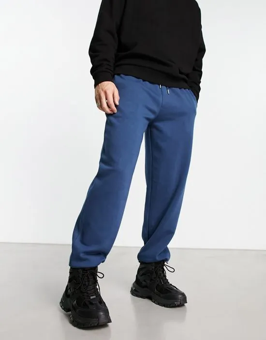 https://images.styletyx.com/images/collusion-sweatpants-in-navy-collusion-13139785_1.webp
