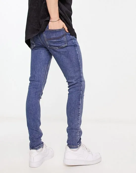https://images.styletyx.com/images/collusion-x001-skinny-jeans-in-blue-collusion-13237400_2.webp