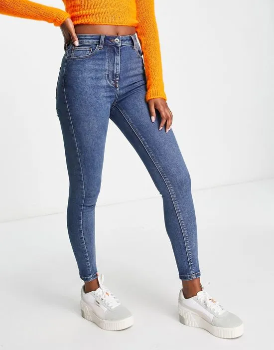 https://images.styletyx.com/images/collusion-x001-skinny-jeans-in-blue-collusion-2752837_4.webp