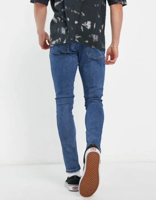 https://images.styletyx.com/images/collusion-x001-skinny-jeans-in-blue-mid-wash-collusion-13000675_2.webp