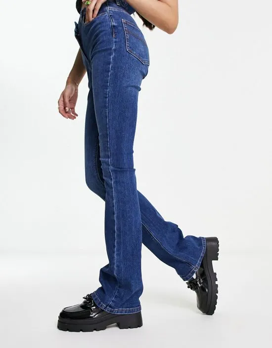 https://images.styletyx.com/images/collusion-x008-flare-jeans-in-blue-collusion-2765629_4.webp