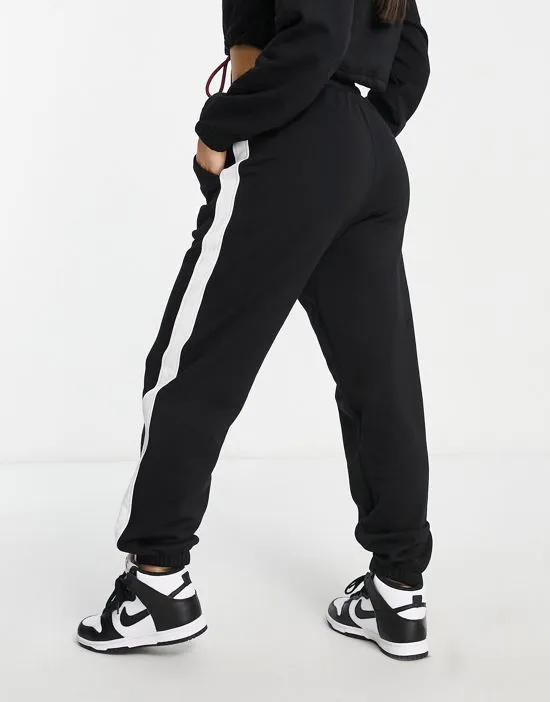 https://images.styletyx.com/images/color-block-joggers-in-black-hiit-3265311_2.webp