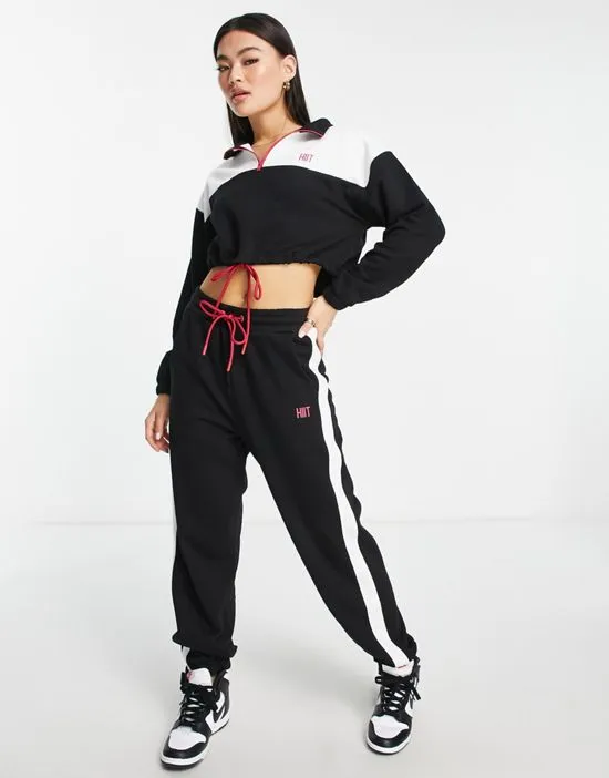 https://images.styletyx.com/images/color-block-joggers-in-black-hiit-3265311_4.webp