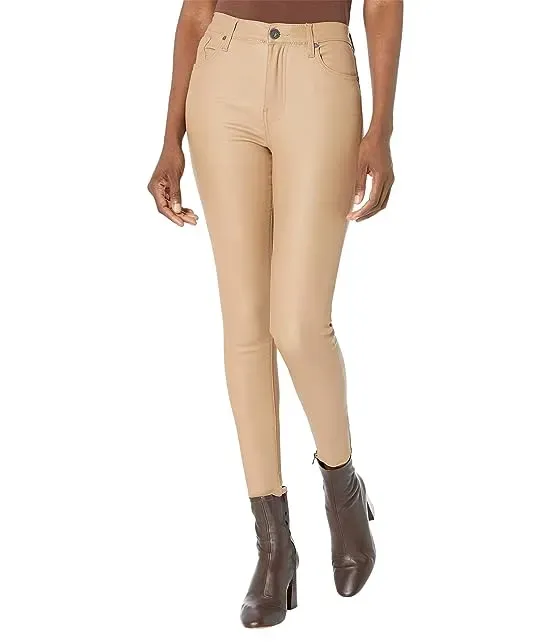 https://images.styletyx.com/images/connie-coated-high-rise-fab-ab-ankle-skinny-with-raw-hem-in-caramel-kut-from-the-kloth-13271861_1.webp