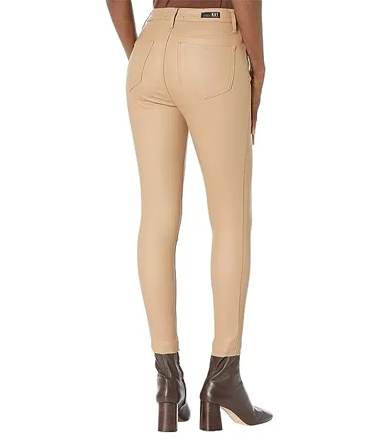 https://images.styletyx.com/images/connie-coated-high-rise-fab-ab-ankle-skinny-with-raw-hem-in-caramel-kut-from-the-kloth-13271861_2.webp