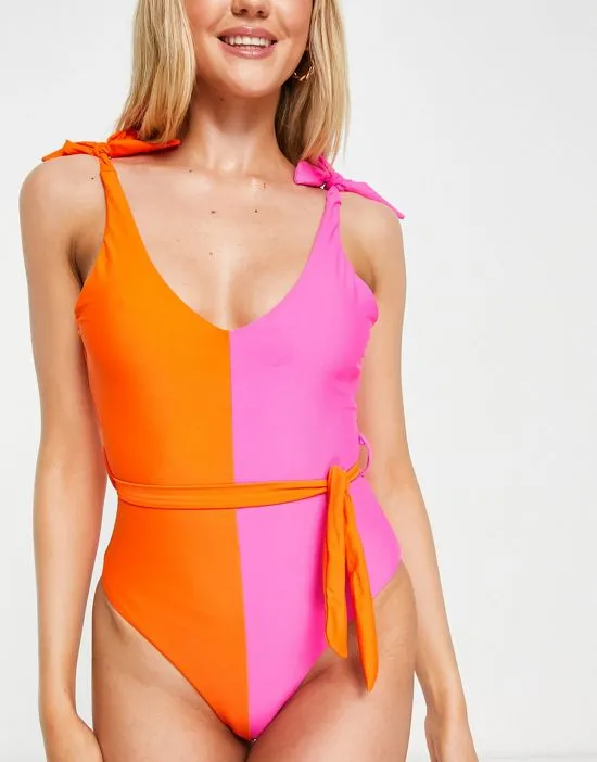https://images.styletyx.com/images/contrast-belt-swimsuit-in-color-block-never-fully-dressed-2345827_4.webp