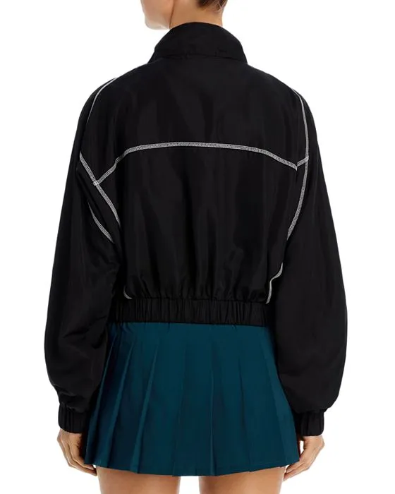 https://images.styletyx.com/images/contrast-trim-windbreaker-jacket-year-of-ours-13059794_2.webp