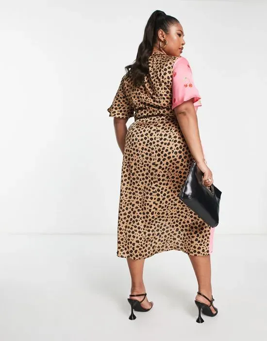 https://images.styletyx.com/images/contrast-wrap-midi-dress-in-cherry-leopard-print-never-fully-dressed-plus-2785197_2.webp