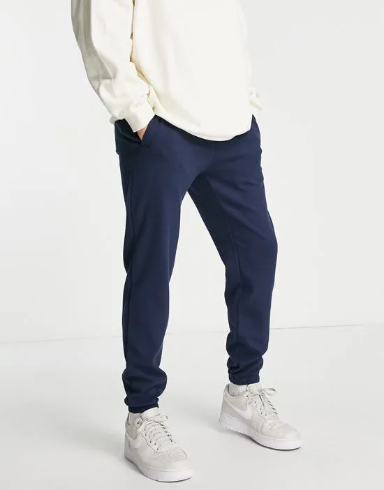 https://images.styletyx.com/images/cotton-blend-jersey-slim-fit-sweatpants-in-navy-part-of-a-set-navy-selected-homme-1796873_3.webp