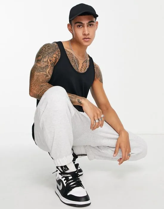https://images.styletyx.com/images/cotton-blend-tank-top-in-black-black-asos-design-1859903_3.webp