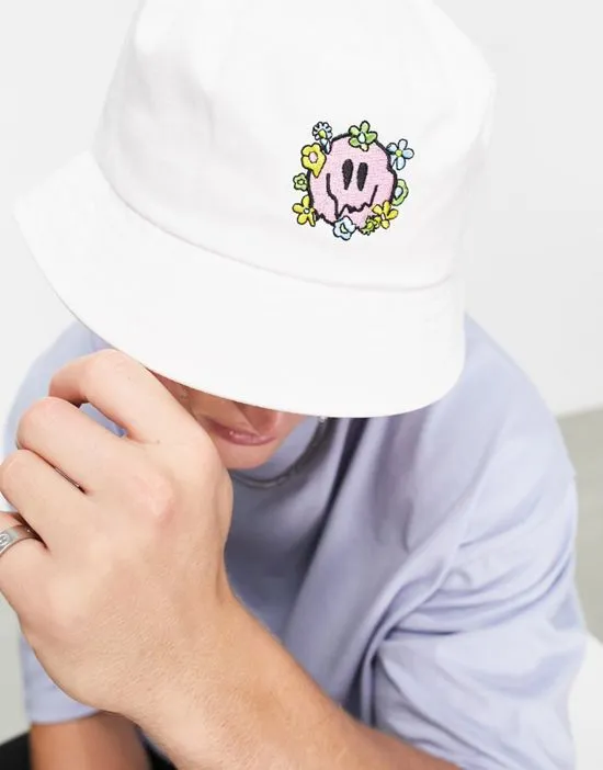 https://images.styletyx.com/images/cotton-bucket-hat-with-smile-embroidery-in-ecru-asos-design-1919033_1.webp